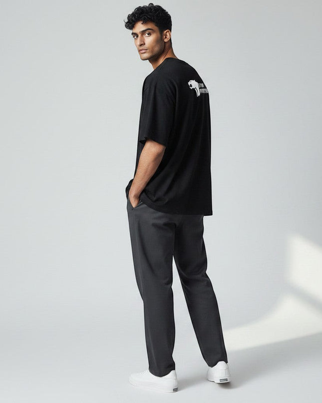 Black 100% cotton t-shirt with white Gym Panthers logo on the back, designed for performance and everyday wear.