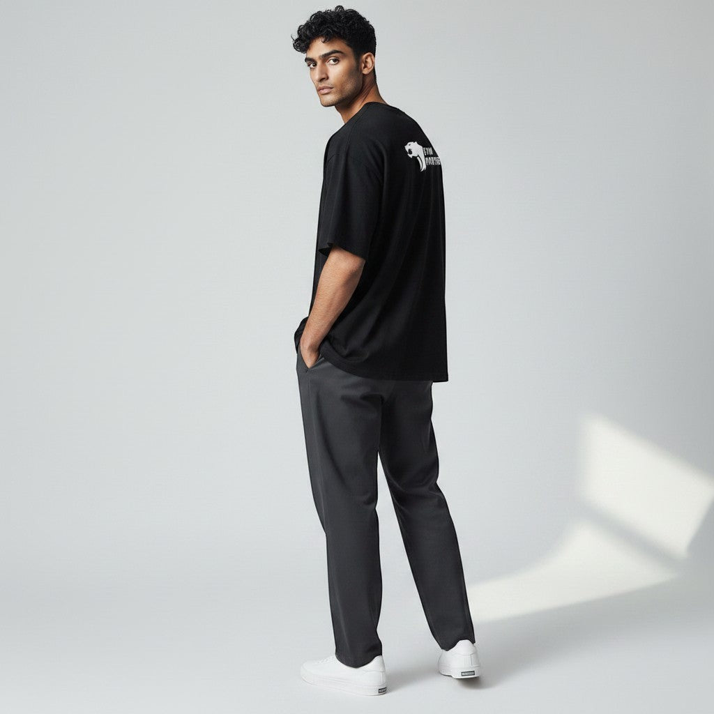 Black 100% cotton t-shirt with white Gym Panthers logo on the back, designed for performance and everyday wear.