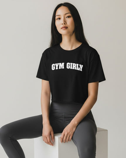 GYM PANTHERS black cotton crop top with white "Gym Girly" text, relaxed fit, short sleeves, crew neck.
