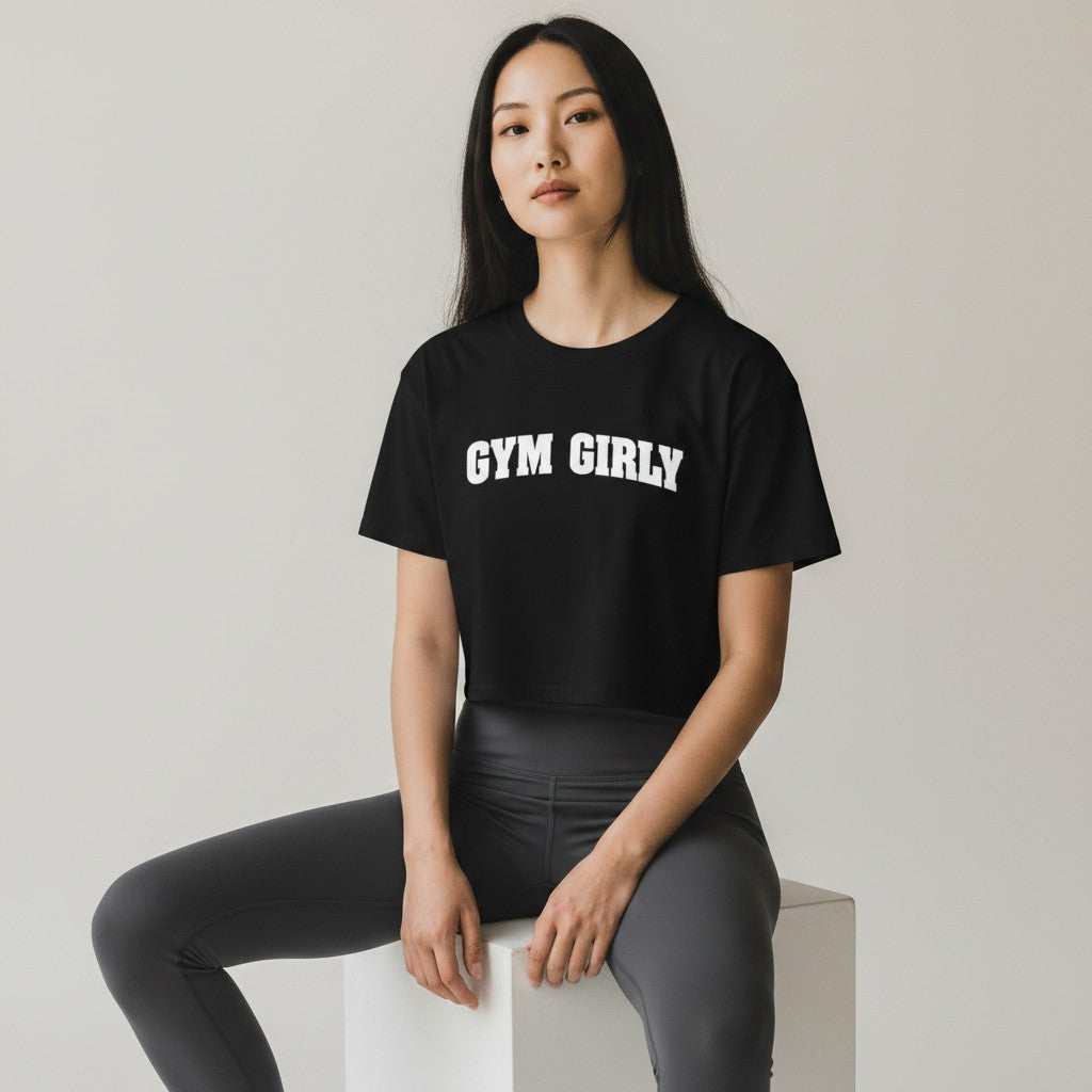 GYM PANTHERS black cotton crop top with white "Gym Girly" text, relaxed fit, short sleeves, crew neck.