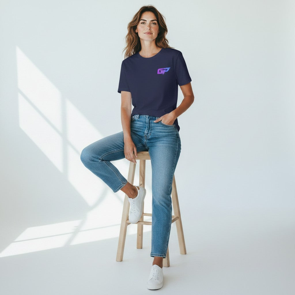 GYM PANTHERS navy blue 100% cotton t-shirt with a small gradient GP logo on the chest, worn by a woman with jeans.