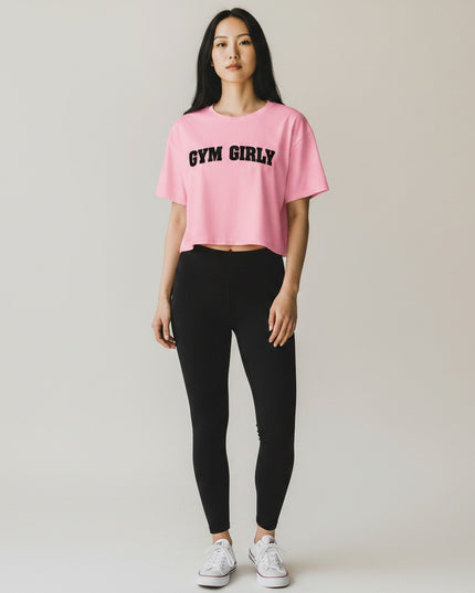GYM PANTHERS pink cotton crop top with black 'Gym Girly' text, short sleeves, crew neck, relaxed fit.