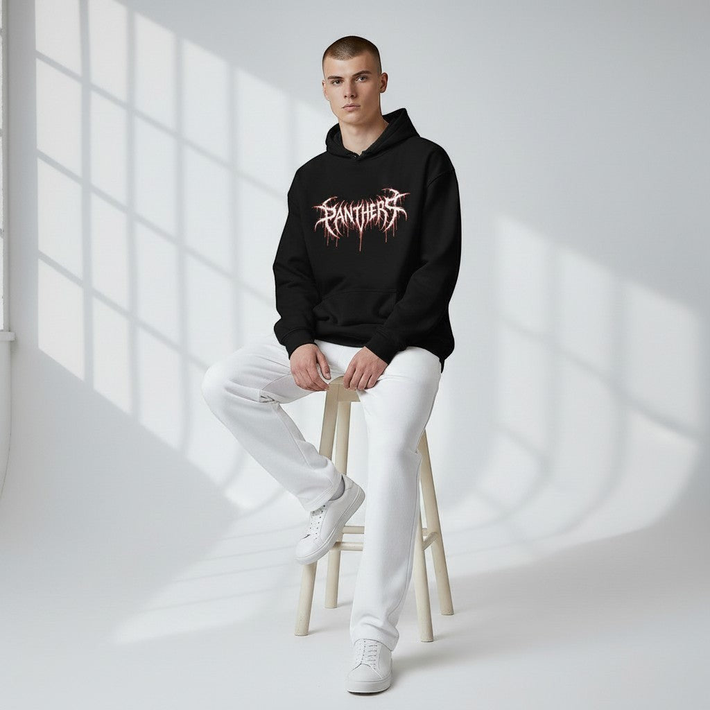 GYM PANTHERS black cotton hoodie with a white graphic logo and dripping typography, worn by a male model with white sweatpants.